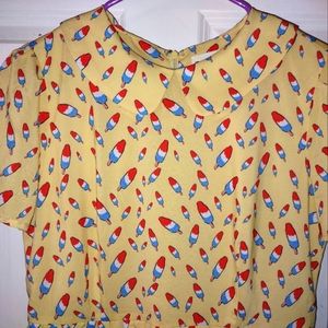 Cute retro styled dress with popsicles on it.